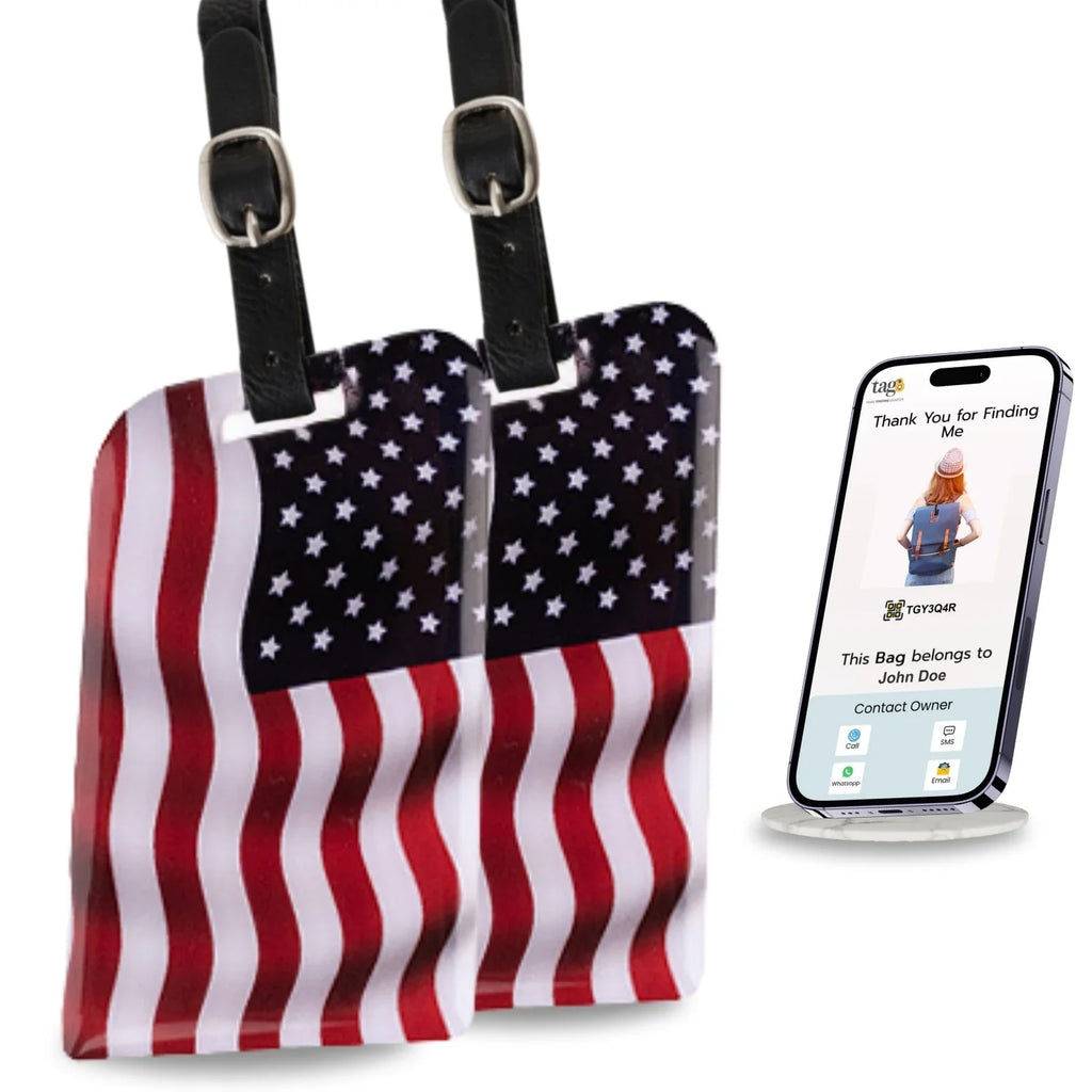 Two USA flag-themed smart bag security tags with QR codes from Global Lost Recovery Service, used for luggage security.